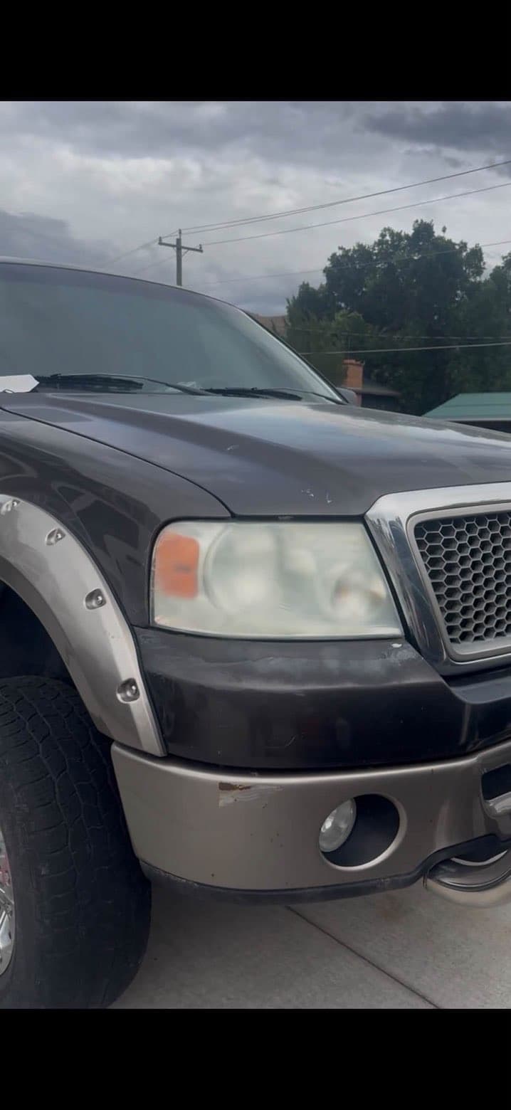 Ford F-150 before restoration with hazy headlights