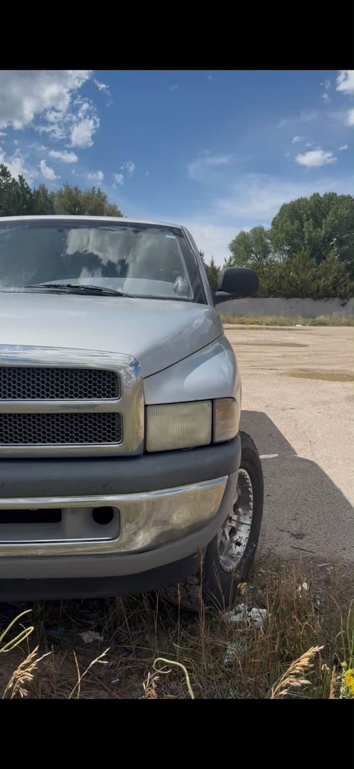 Dodge Ram before restoration with yellow cloudy headlights